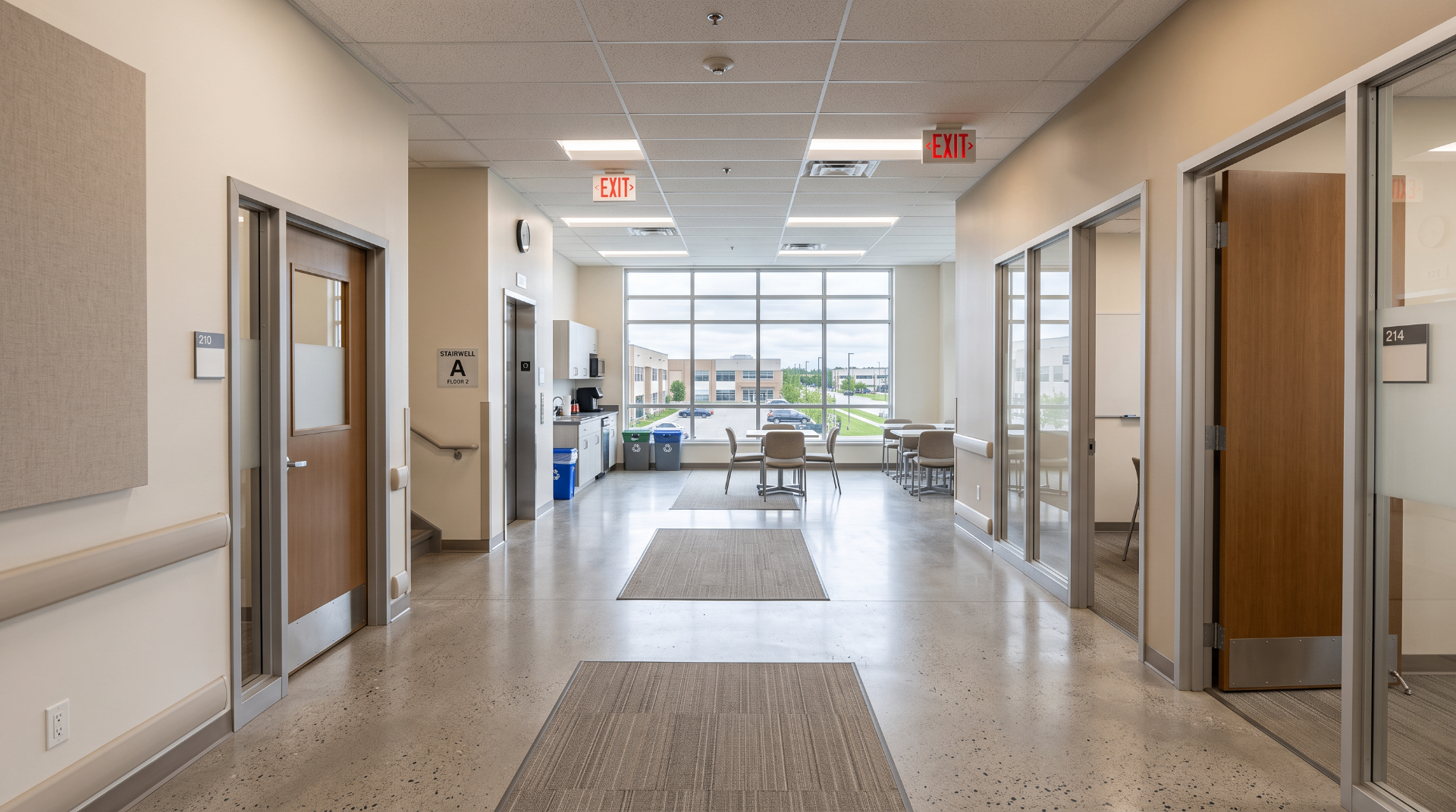 Bright, neutral interior common area in a modern commercial facility.